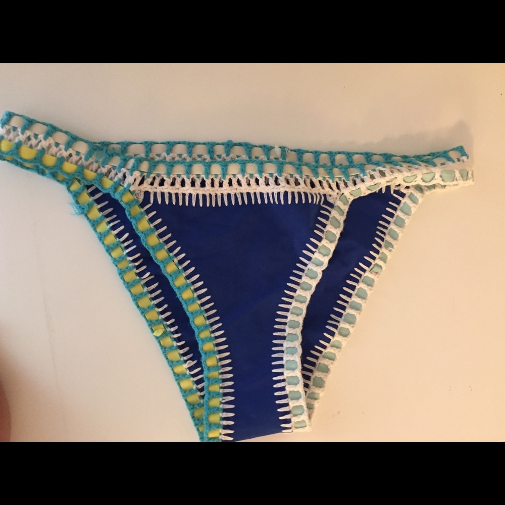 Crochet blue swim bottoms. Size small.